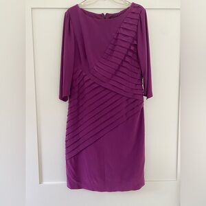 Dark plum colored dress. Wore it once to a fall wedding.